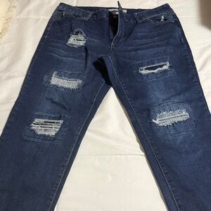 Women’s Distressed Blue Jeans